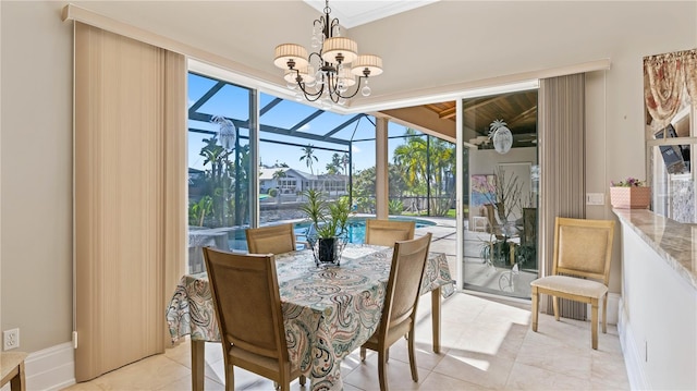 tiled dining room featuring a wall of windows and a notable chandelier