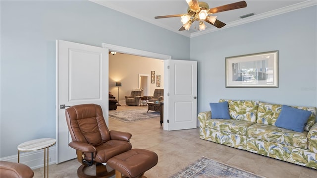 living room with ceiling fan and crown molding