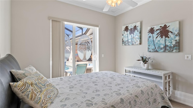 bedroom with ornamental molding, hardwood / wood-style floors, and ceiling fan