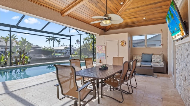 sunroom / solarium featuring beam ceiling, wood ceiling, ceiling fan, and a pool