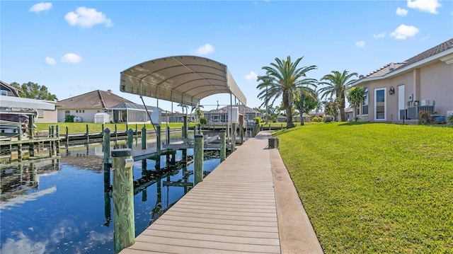 view of dock with a water view, a lawn, and cooling unit