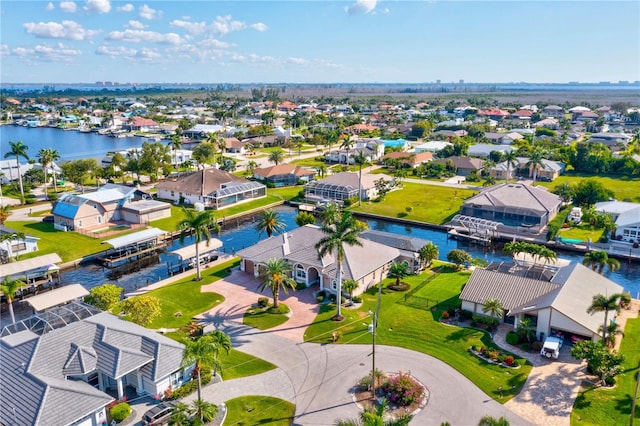 drone / aerial view with a water view