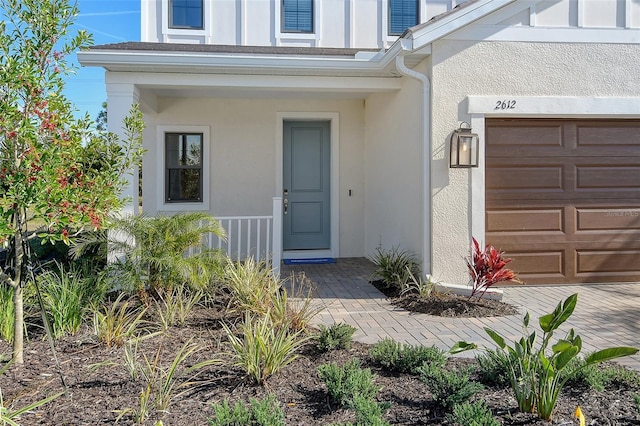 property entrance featuring a garage