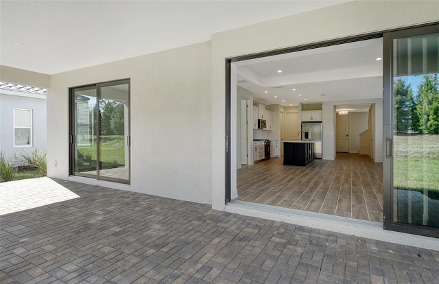 view of patio with an outdoor kitchen