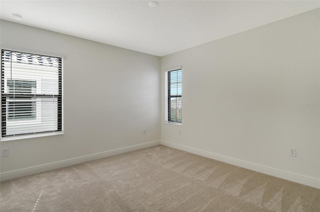 view of carpeted spare room