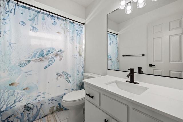 bathroom with vanity, toilet, a shower with curtain, and tile patterned flooring