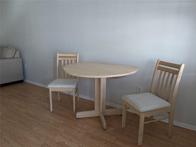 1570 Pleasant Rd Unit J-26, Bradenton, FL 34207 - dining room featuring hardwood / wood-style floors
