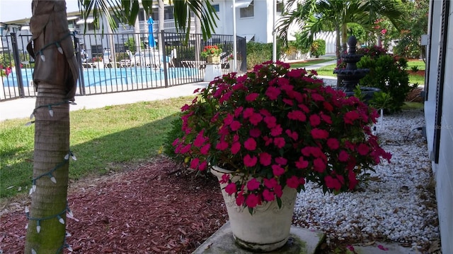 1570 Pleasant Rd Unit J-26, Bradenton, FL 34207 - view of yard featuring a community pool