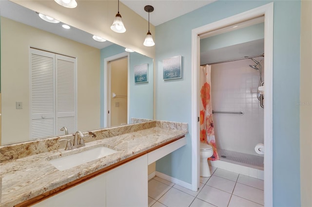 7201 29th Avenue Dr W Unit 309, Bradenton, FL 34209 - full bathroom with tile patterned floors, vanity, a closet, and a stall shower