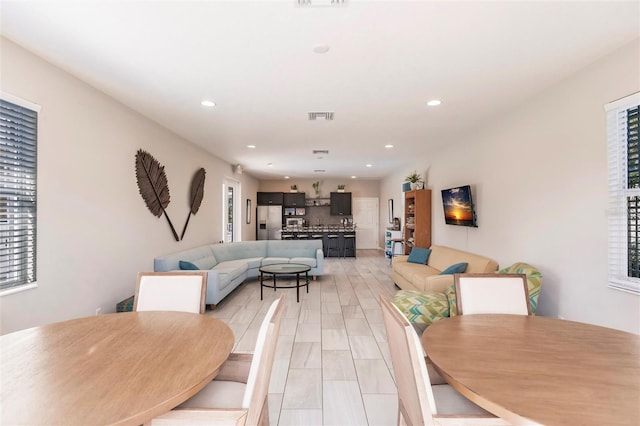 dining area with plenty of natural light