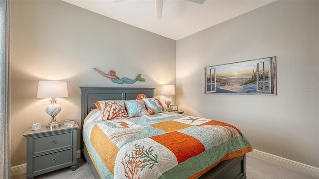 carpeted bedroom with ceiling fan and lofted ceiling