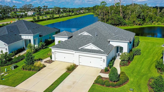 bird's eye view with a water view