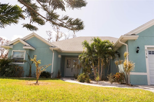 view of front of home featuring a front yard