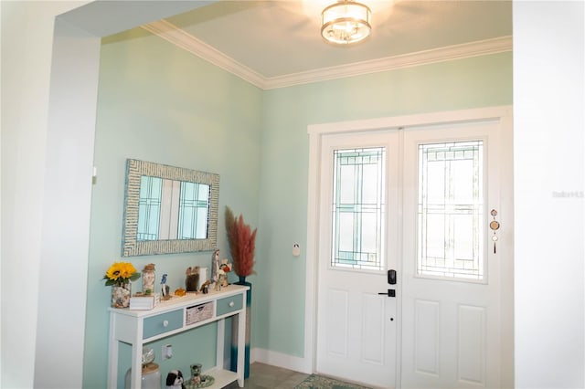 foyer entrance featuring crown molding