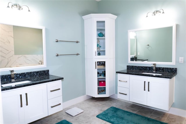 bathroom with vanity and tile patterned flooring