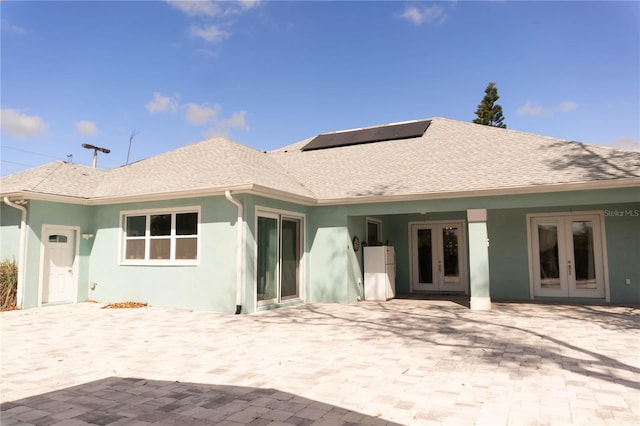 back of house featuring french doors and a patio area