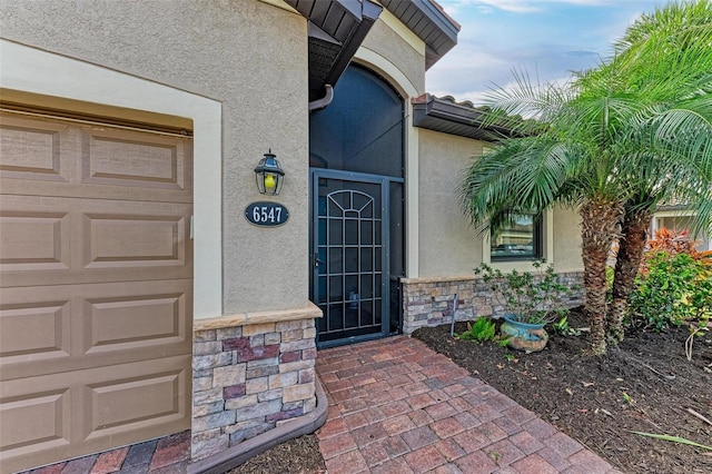 6547 Willowshire Way, Bradenton, FL 34212 - property entrance featuring stucco siding and stone siding