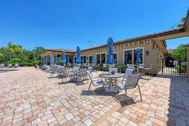 6547 Willowshire Way, Bradenton, FL 34212 - view of patio / terrace featuring fence and a community pool