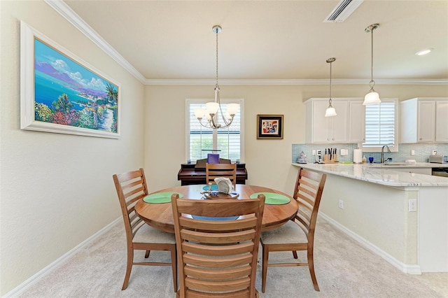 6547 Willowshire Way, Bradenton, FL 34212 - dining room with light carpet, a chandelier, ornamental molding, and baseboards