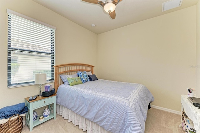 6547 Willowshire Way, Bradenton, FL 34212 - bedroom featuring light carpet, baseboards, and ceiling fan