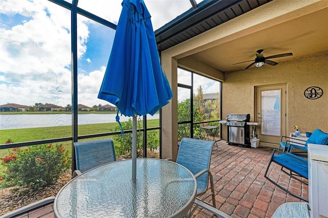 6547 Willowshire Way, Bradenton, FL 34212 - sunroom / solarium with a water view, outdoor dining space, and ceiling fan