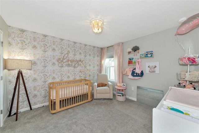 carpeted bedroom with a crib