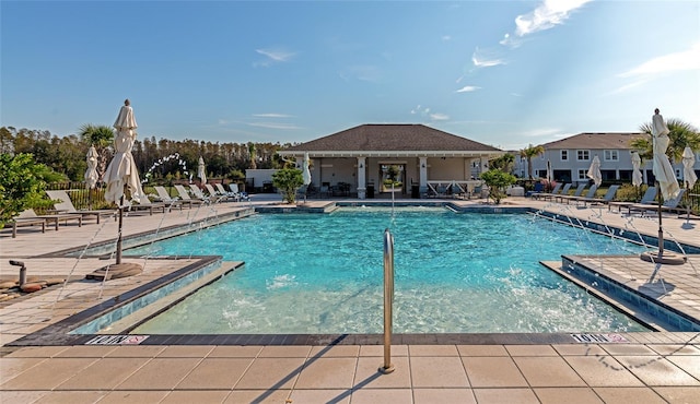 view of pool featuring a patio area