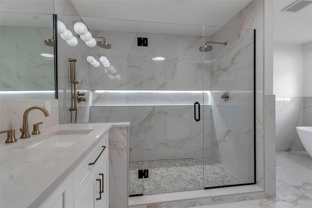 bathroom featuring vanity, walk in shower, and tile walls