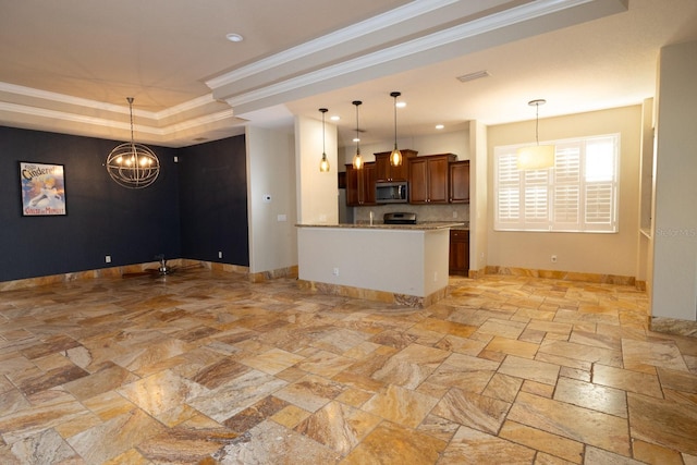 kitchen with kitchen peninsula, appliances with stainless steel finishes, decorative light fixtures, and ornamental molding