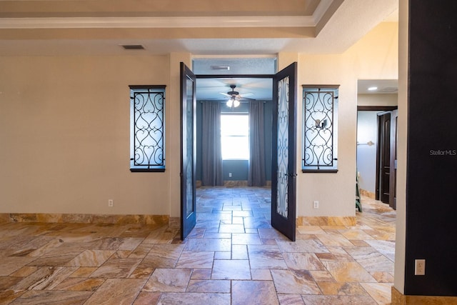 entryway with ceiling fan