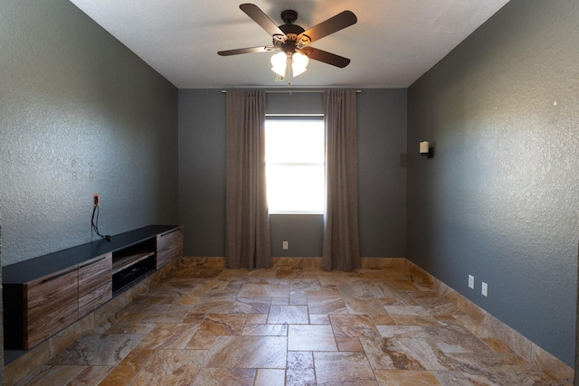 empty room with ceiling fan