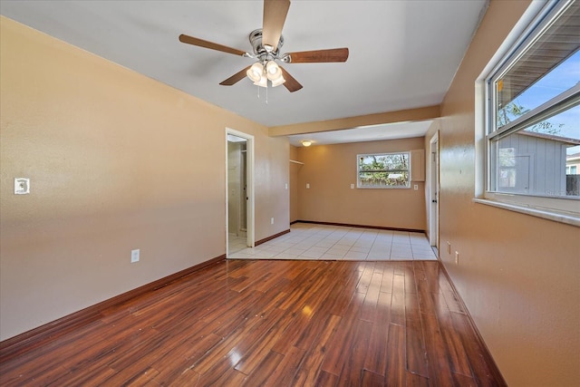 empty room featuring light hardwood / wood-style floors and ceiling fan