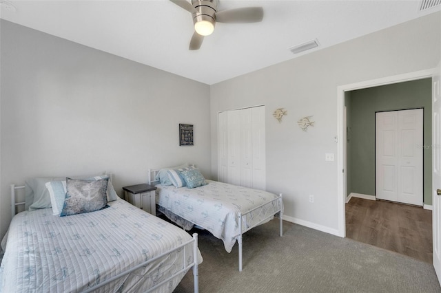 carpeted bedroom with a closet and ceiling fan