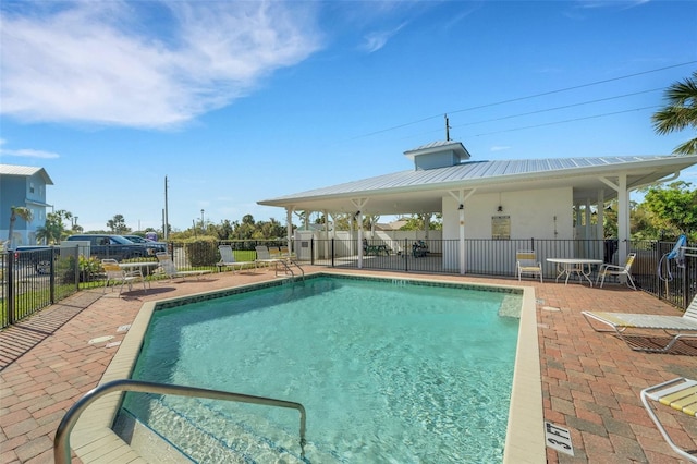 view of pool featuring a gazebo and a patio area