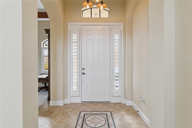 entrance foyer featuring light tile patterned flooring