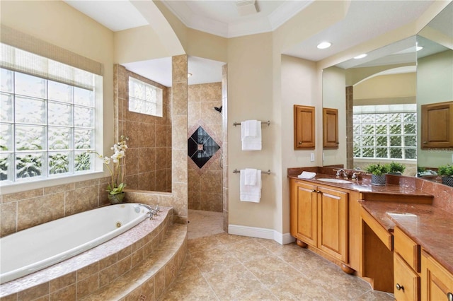 bathroom with tile patterned flooring, vanity, crown molding, and independent shower and bath