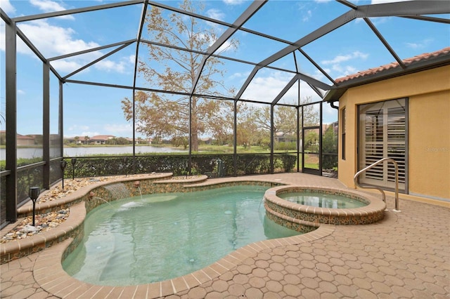 view of pool with a patio, a water view, a lanai, and an in ground hot tub