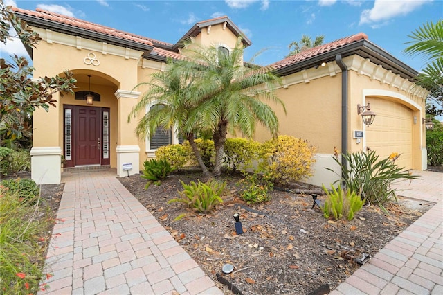 view of front of home with a garage