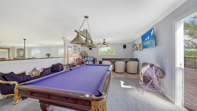 recreation room with pool table, crown molding, and carpet flooring