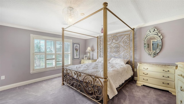 carpeted bedroom featuring ornamental molding and a textured ceiling