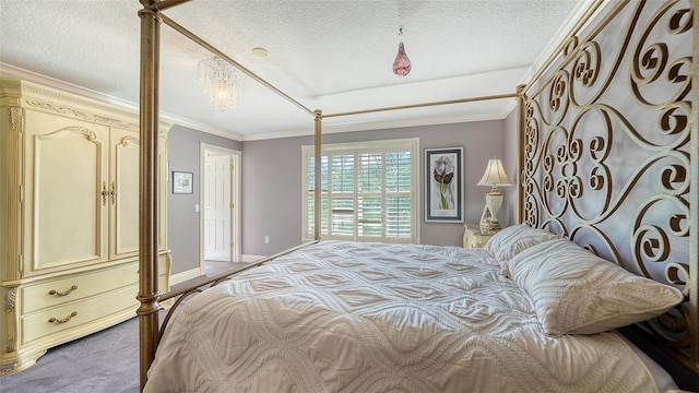 carpeted bedroom featuring crown molding and a textured ceiling