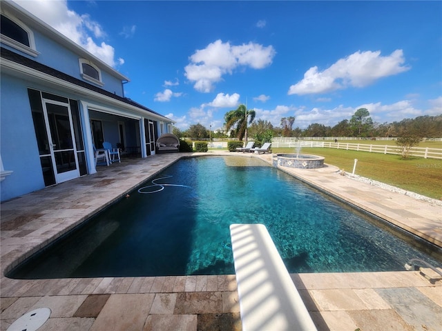 view of pool featuring a patio