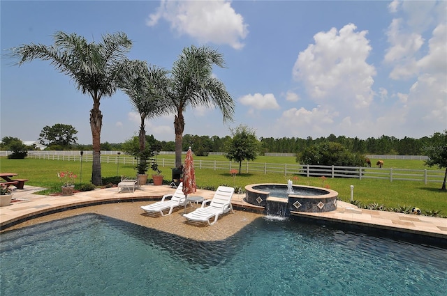 view of pool featuring a rural view, a yard, an in ground hot tub, and pool water feature