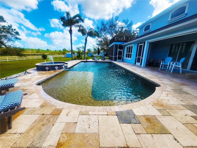 view of pool with a patio and an in ground hot tub