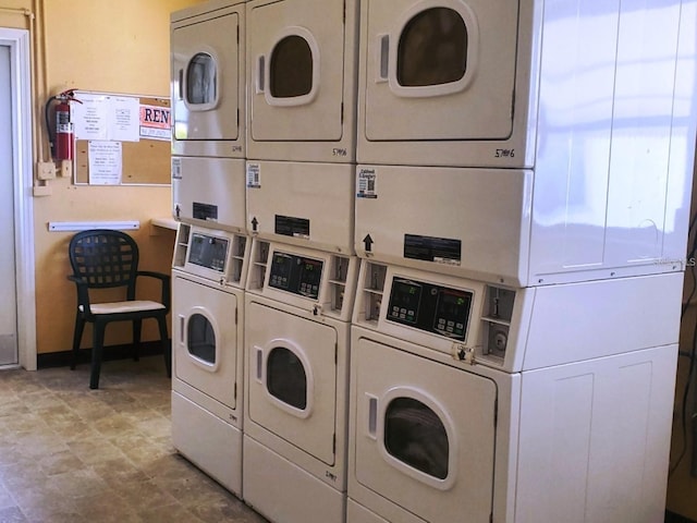 laundry room featuring stacked washing maching and dryer and washer and dryer