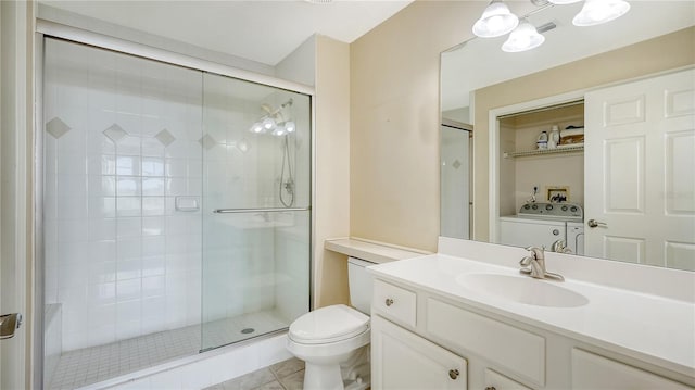 bathroom with toilet, an enclosed shower, vanity, and tile patterned floors