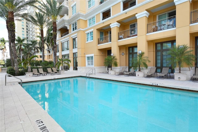 view of pool featuring a patio