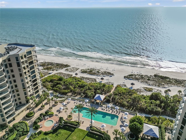 aerial view featuring a water view and a view of the beach