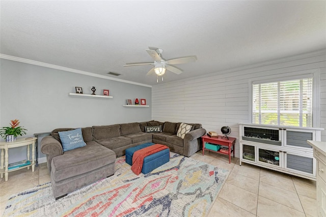 tiled living room with crown molding, a textured ceiling, and ceiling fan