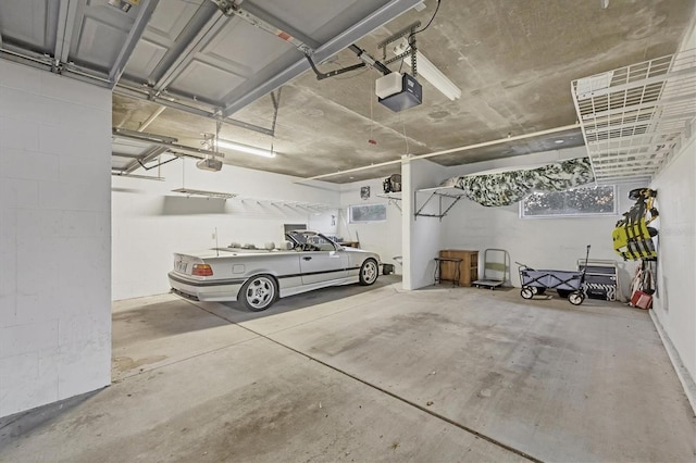 garage featuring a garage door opener